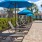 chairs and umbrellas by a pool