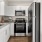 a kitchen with white cabinets